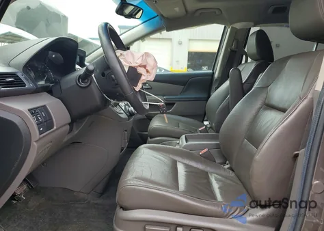 2012 Honda Odyssey Exl z USA, uszkodzony, nr VIN 5FNRL5H60CB030710